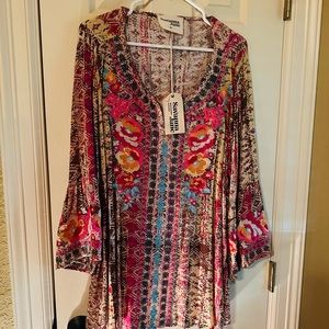 Multi colored embroidered top or swimsuit cover.